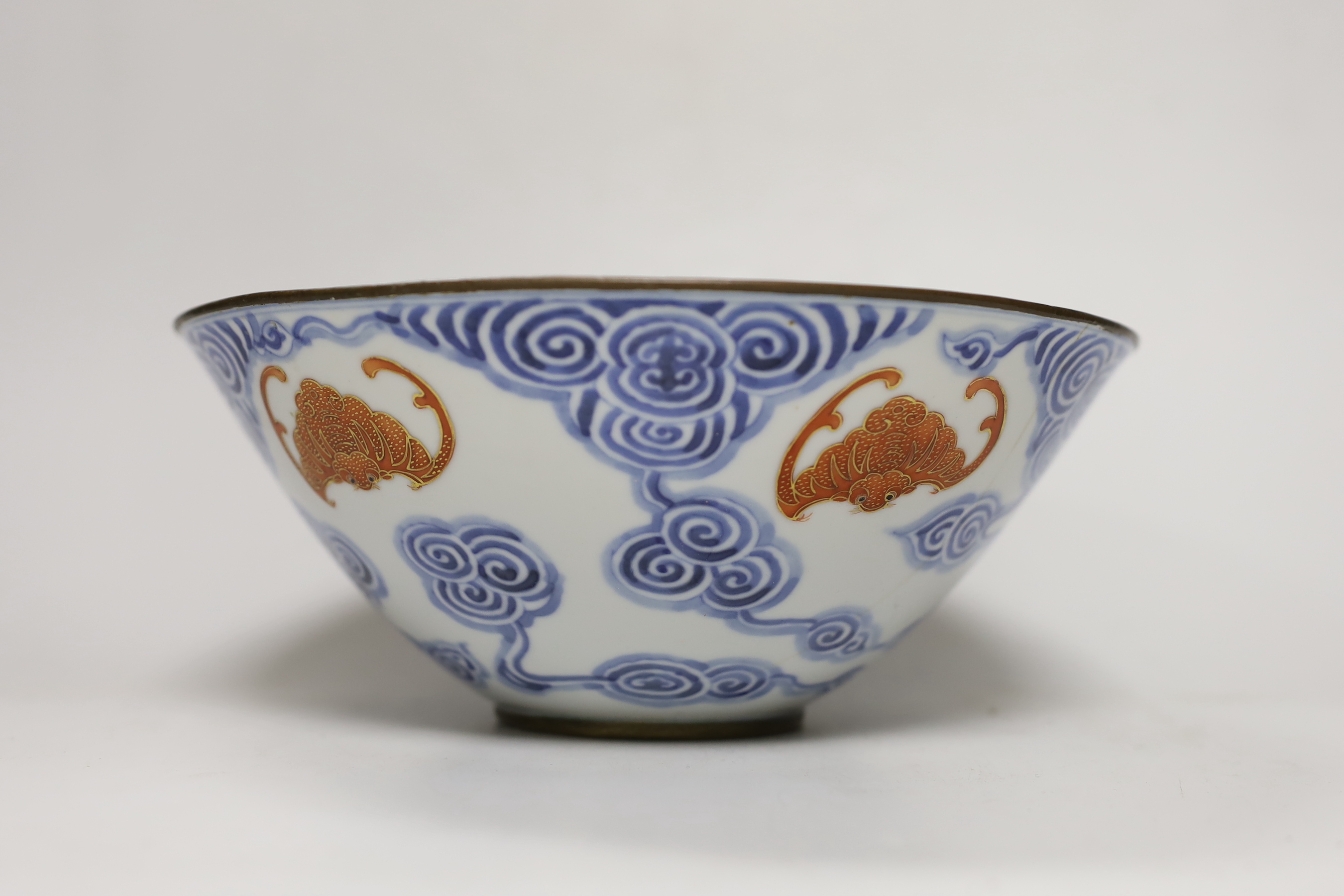 A 19th century Chinese blue and white bowl with iron-red bats, 23cm diam.